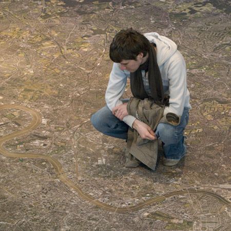 Studying the city map in the city hall